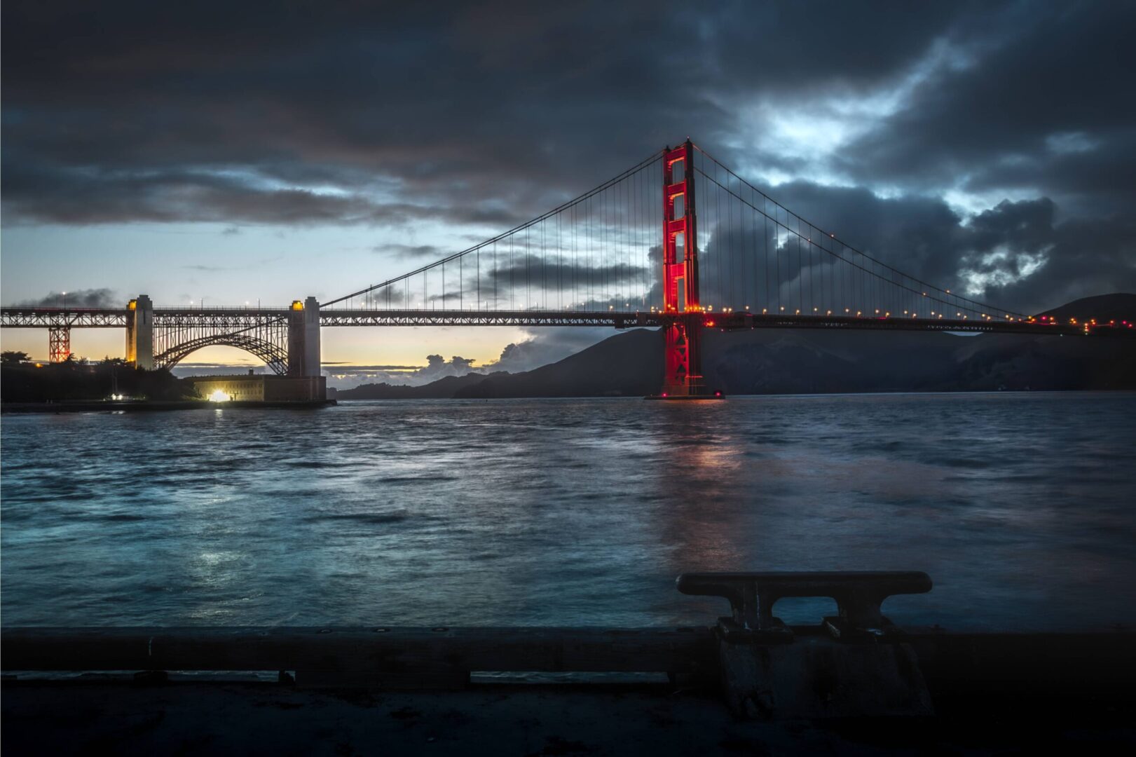 Golden Gate Bridge at night A bridge with the golden gate in the background
