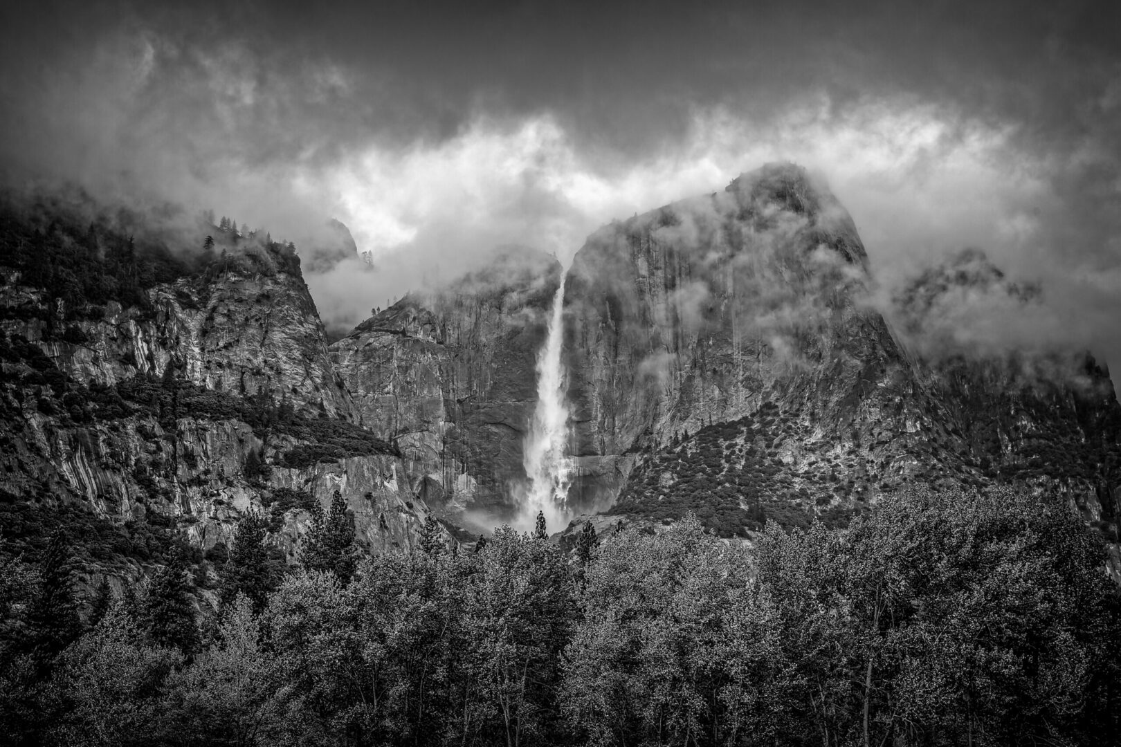 Yosemite Falls_BW_mockup140506 A black and white photo of the waterfall in front of some mountains.