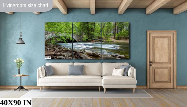 A living room with a couch and a wall hanging