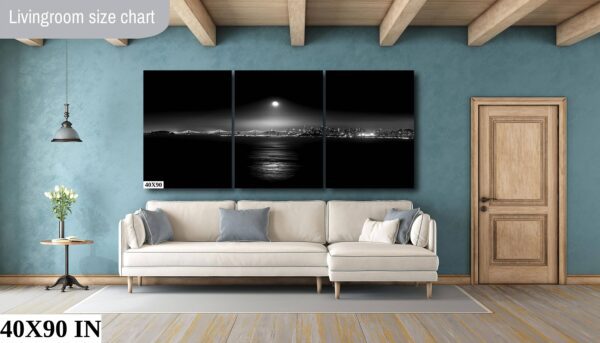 A living room with a couch and a wall hanging
