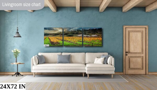 A living room with a couch and a painting on the wall