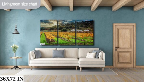 A living room with a couch and a wall hanging