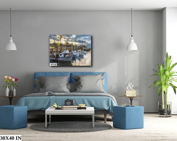 A bedroom with a blue bed and gray walls