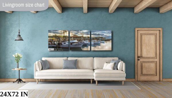 A living room with a couch and a wall hanging