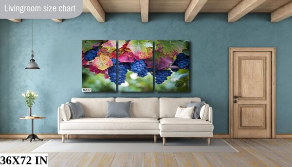 A living room with a couch and some paintings