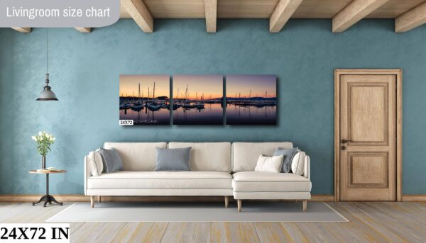 A living room with a couch and a wall hanging