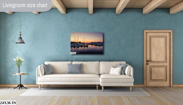 A living room with a couch and a painting on the wall