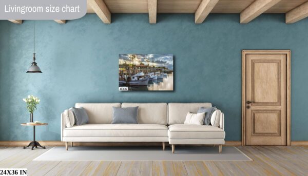 A living room with a couch and a painting on the wall