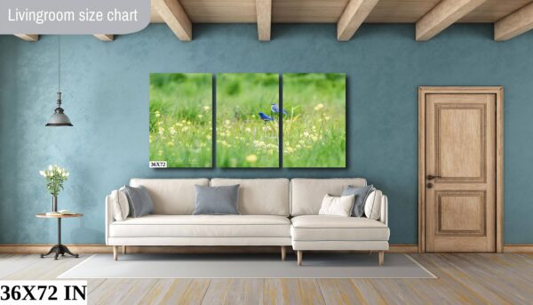 A living room with a couch and a wall hanging