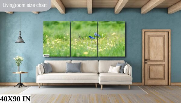 A living room with a couch and a wall hanging