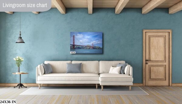 A couch and pillows in front of a wall with a picture on it.