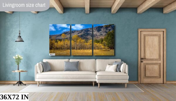 A living room with a couch and a wall hanging