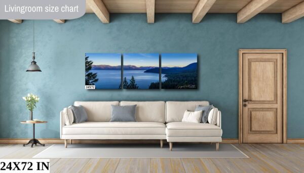 A living room with a couch and a wall hanging