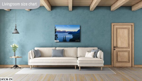 A living room with a couch and a painting on the wall