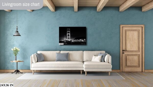 A white couch sitting in front of a blue wall.