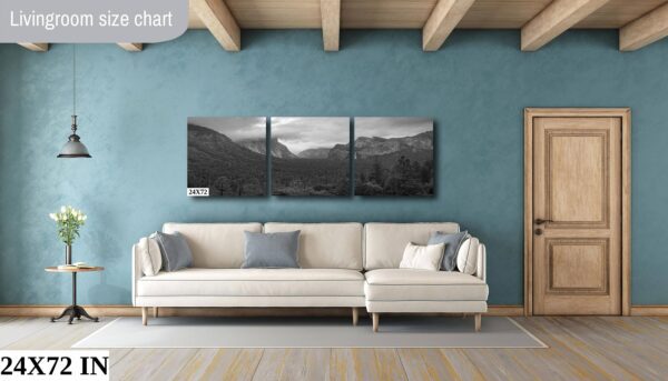 A living room with a couch and a wall hanging