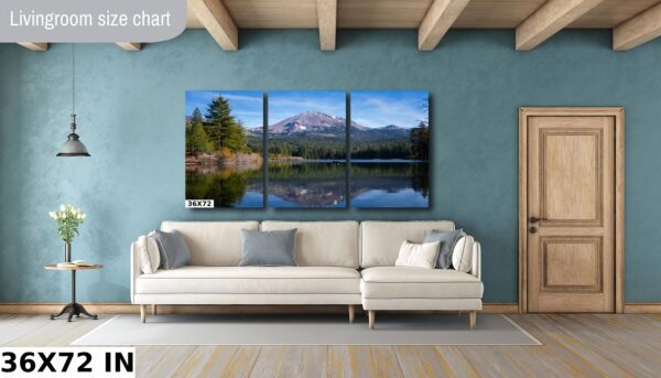 A living room with a couch and a wall hanging