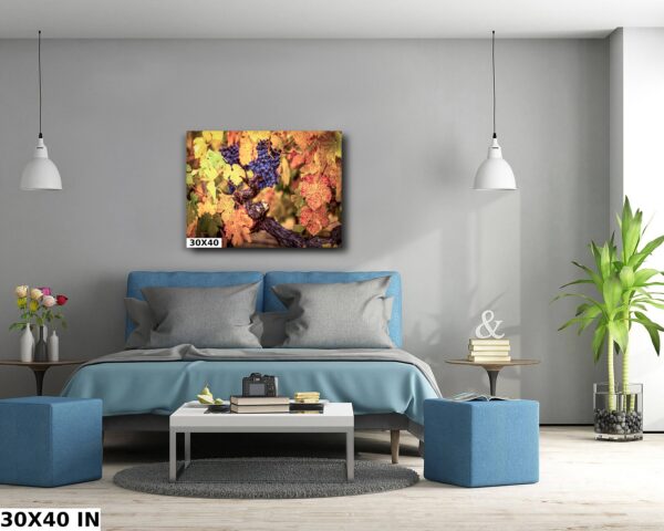 A bedroom with a blue bed and gray walls