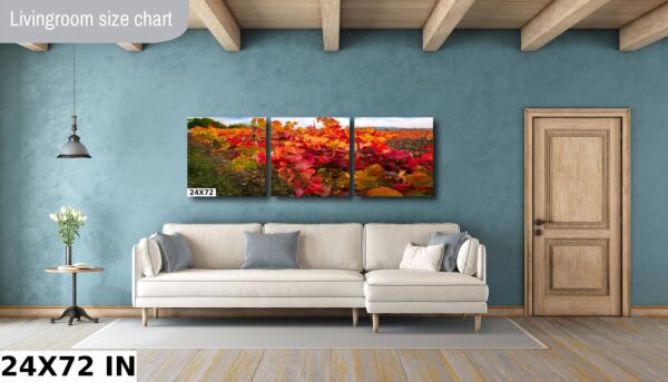 A living room with a couch and some paintings