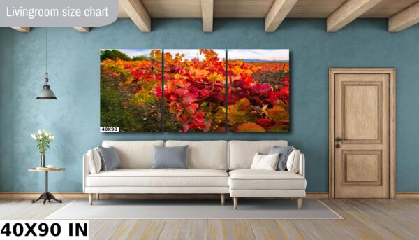 A living room with a couch and some paintings