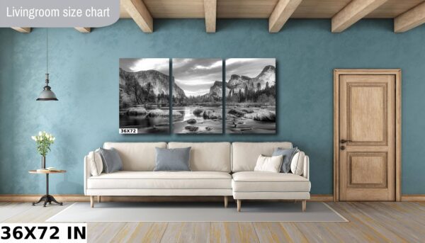 A living room with a couch and a wall hanging