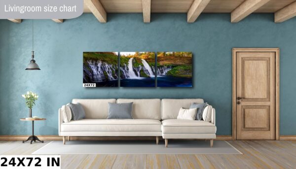 A living room with a couch and a wall hanging