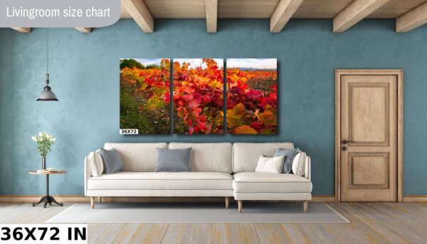A living room with a couch and a wall hanging