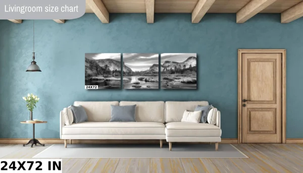 A living room with a couch and wall art
