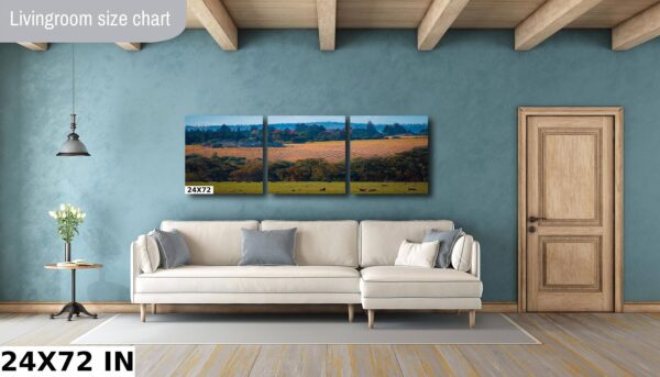 A living room with a couch and a wall hanging