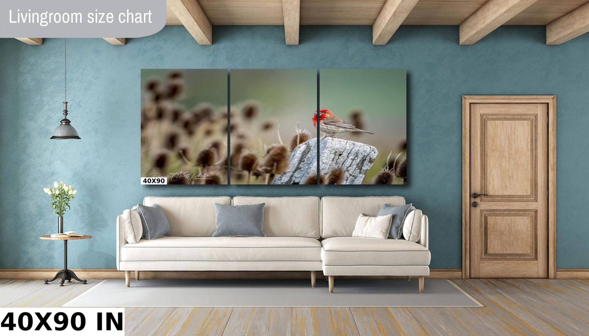 A living room with a couch and a wall hanging
