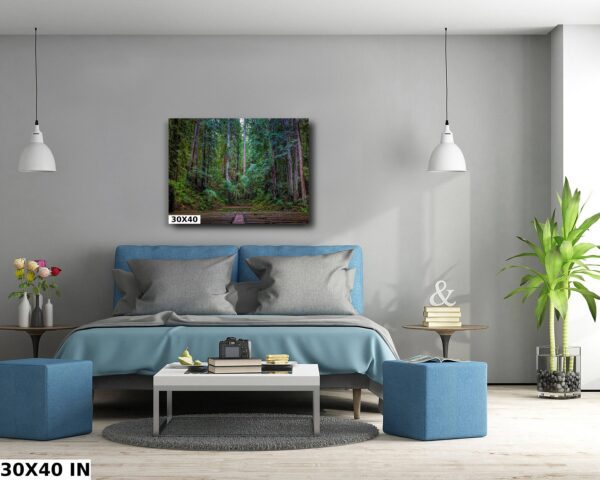 A bedroom with a blue bed and white walls