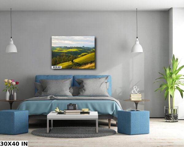 A bedroom with a blue bed and grey walls
