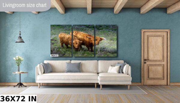 A living room with a couch and some cows