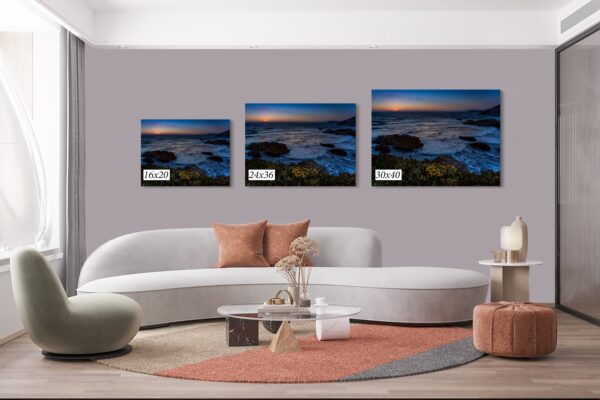 A living room with three different paintings on the wall