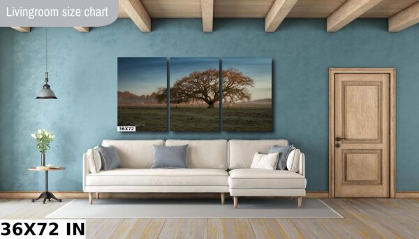 A living room with a couch and a large tree