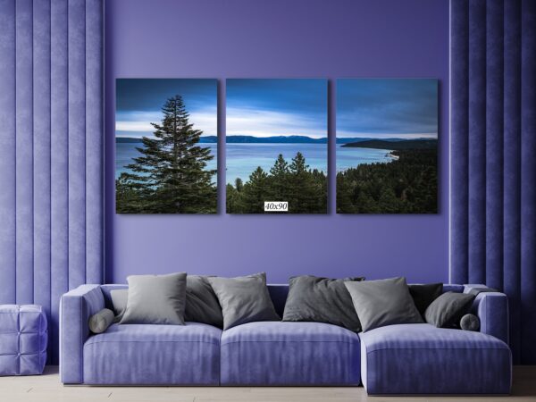 A living room with a couch and wall art