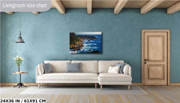 A living room with a couch and a painting on the wall