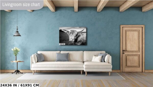 A living room with a couch and a painting