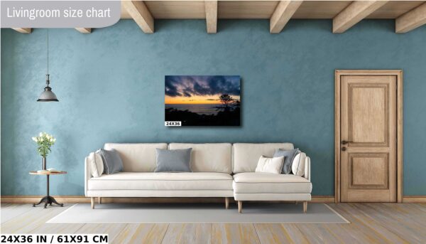A living room with a couch and a painting