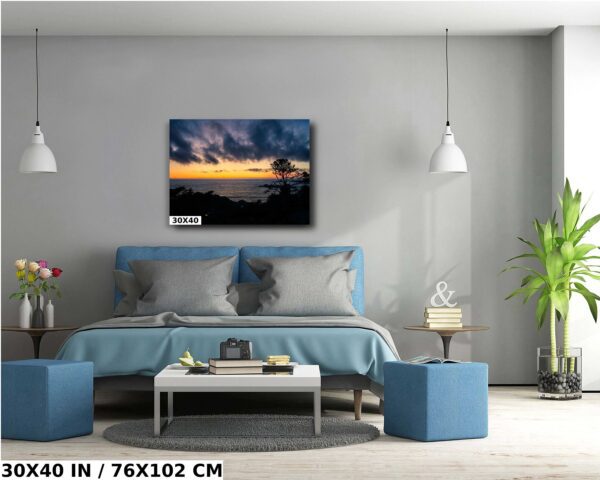 A bedroom with blue walls and a painting of the sky