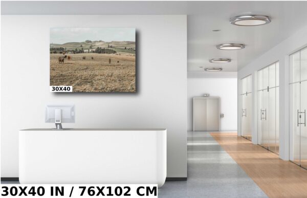 A large picture of some animals in the field