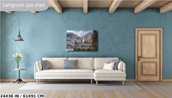 A living room with a couch and a painting