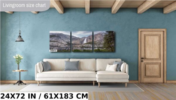 A living room with a couch and a wall hanging