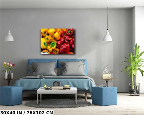 A living room with blue furniture and a bed