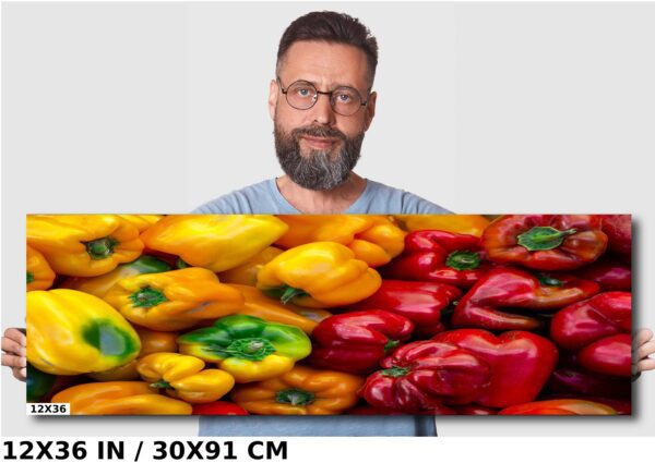 A man standing in front of a large painting.