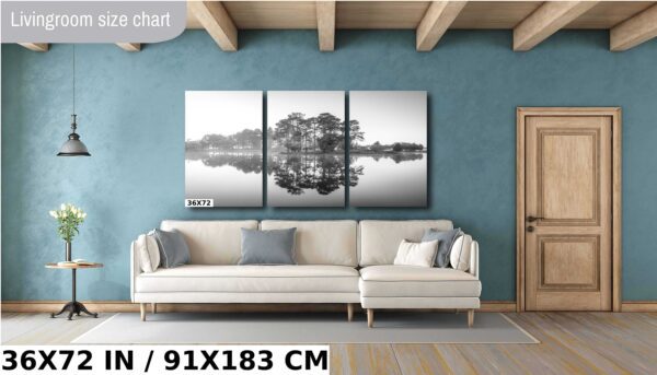 A living room with a couch and a wall hanging