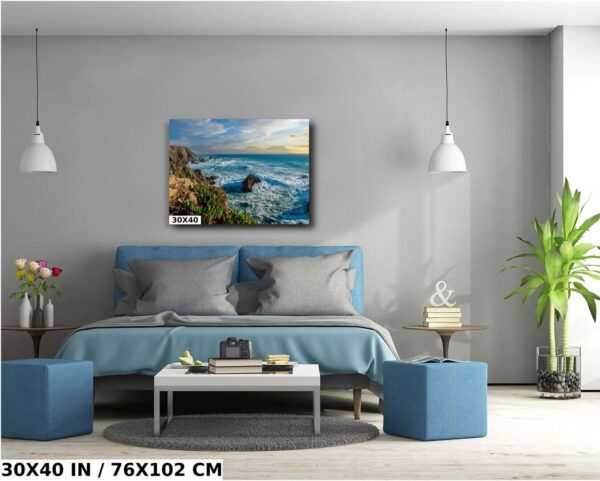 A bedroom with a bed and two blue ottomans