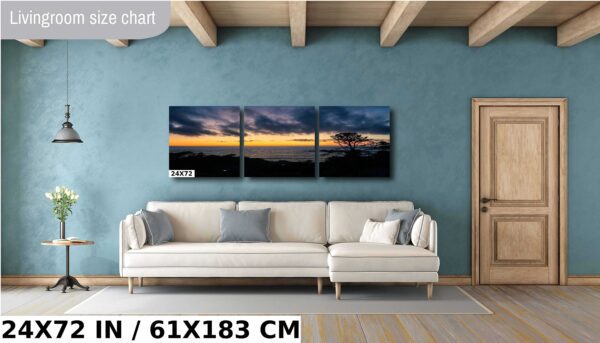 A couch and some pillows on the wall