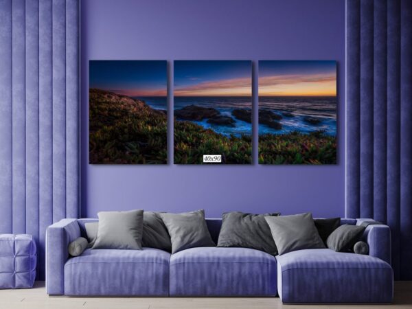 A living room with purple walls and a couch