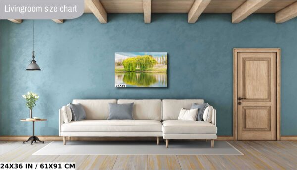 A living room with a couch and a painting on the wall